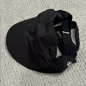 lululemon athletica Black visor with decorative tie in back